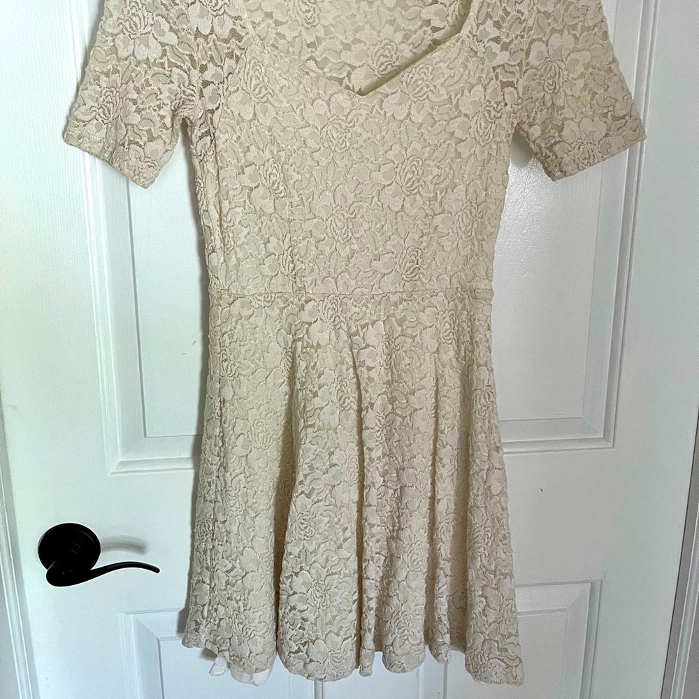 Stretch lace cream colored skater dress
